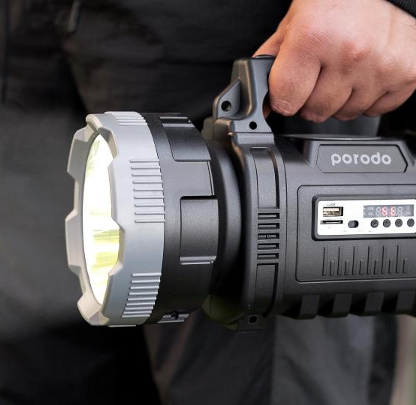 كشاف بورودو لايف ستايل الخارجي 3 في 1 مع راديو FM ومكبر صوت بلوتوث بقدرة 10 واط - اسود/رمادي | Porodo LifeStyle Outdoor 10W 3 in 1 Flashlight with FM Radio and Bluetooth Speaker - Black/Grey